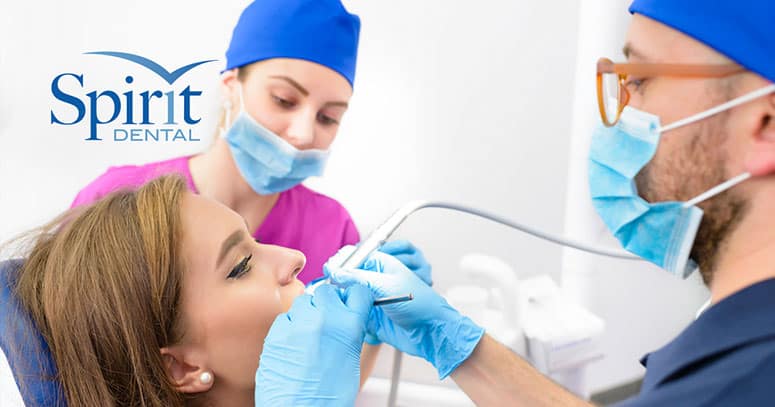 Lady in dentist chair getting a root canal